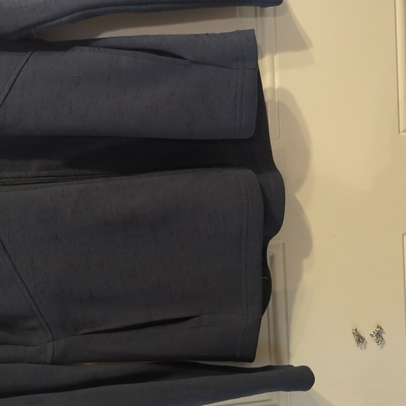 Stay Warm and Protected in Style with Skechers Performance Pro Knit Jacket! - Picture 3 of 12